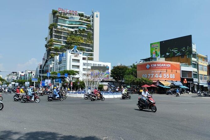 Da Nang Food Tour Motorbike & Sightseeing By Ao Dai Lady Rider - Love Bridge Stop: Easy Photos With Real City-View Payoff