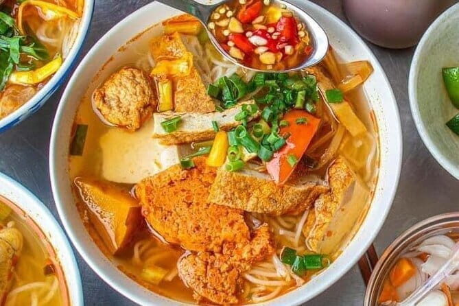 Da Nang Motorbike Tour with Local Guide-Food, Culture-Hidden Gems - Mi Quang Dung Lunch: The Flat Noodles, Herbs, and Roasted Peanut Detail
