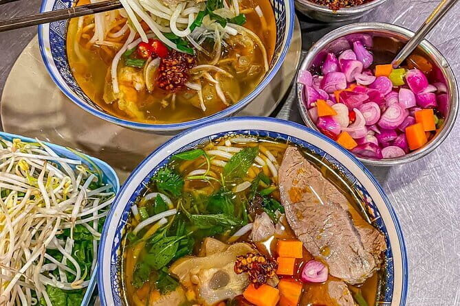 Da Nang Street Food Private Tour With Local Students - Stop 1 in Da Nang: Riding and Sampling in a Sharing Flow