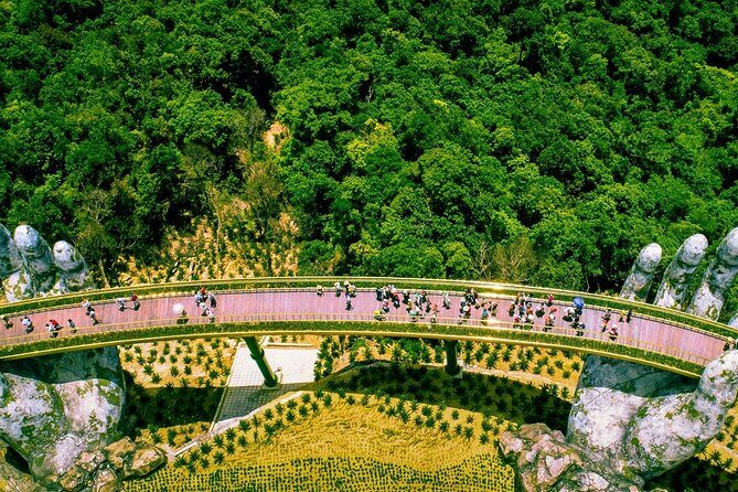 Golden Bridge & Ba Na Hills with Buffets Lunch ,2 ways cable car - Photo game plan for the Golden Bridge hands