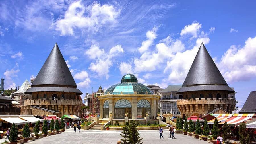 Hoi An/Da Nang: Ba Na Hills & Golden Bridge Small-Group Tour - Second Cable Car to French Village: Street Music, Shrines, and a Lot of Sights