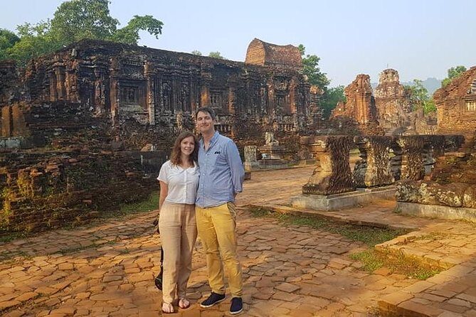 My Son Holyland , Hoi An Ancient City Tour With Night Market , Sampan Boat Ride - Stop 2 and 3: Hoi An Ancient Town streets, Chinese Assembly Hall, and the Japanese Covered Bridge